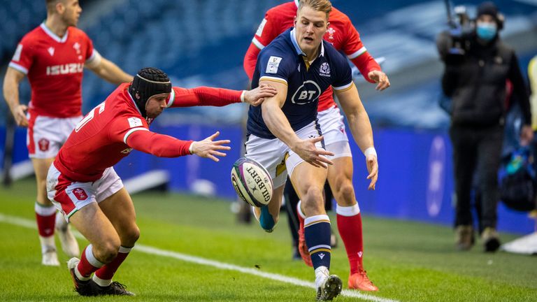 EDINBURGH, SCOTLAND - FEBRUARY 13: Wales' Leigh Halfpenny (left) tackles Scotland's Duhan van der Merwe during a Guinness Six Nations tie between Scotland and Wales at BT Murrayfield, on February 13, 2021, in Edinburgh, Scotland. (Photo by Ross Parker / SNS Group)