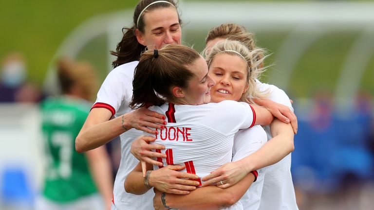 Ella Toone is congratulated for her penalty on England debut