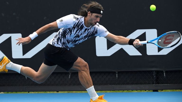 Lopez makes a forehand return against Sonego (AP Photo/Andy Brownbill)
