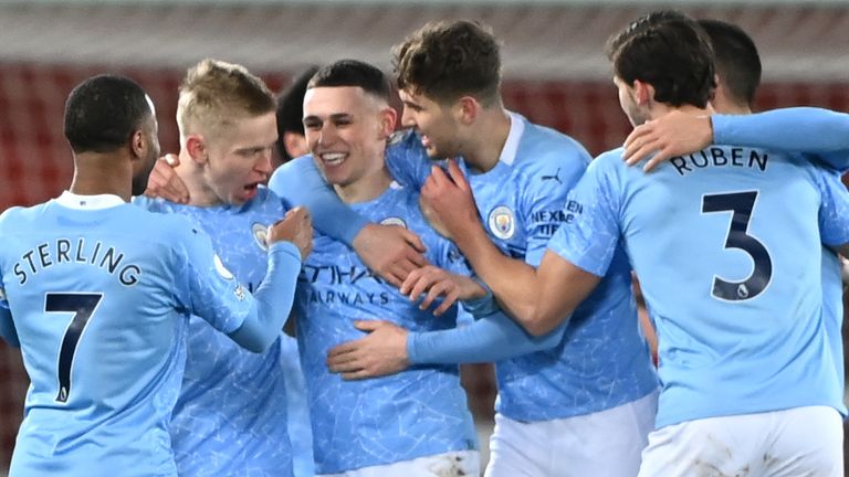 Phil Foden celebrates scoring against Liverpool