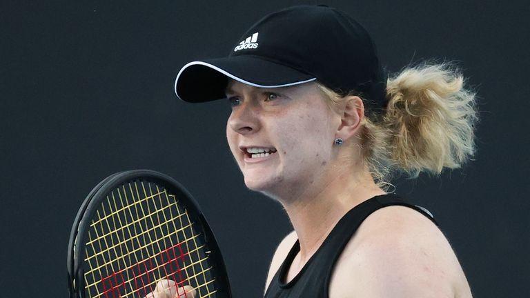 Britain's Francesca Jones reacts after winning a point against United States' Shelby Rogers during their first round match at the Australian Open tennis championship in Melbourne, Australia, Tuesday, Feb. 9, 2021.(AP Photo/Hamish Blair)