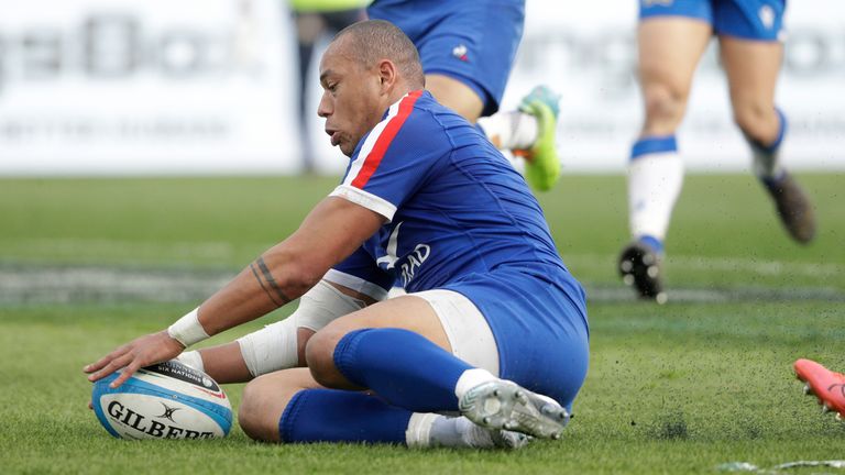 France's Gael Fickou scores his side's second try during the Six Nations rugby union international between Italy and France at Rome's Olympic stadium, Saturday, Feb. 6, 2021. (AP Photo/Gregorio Borgia)