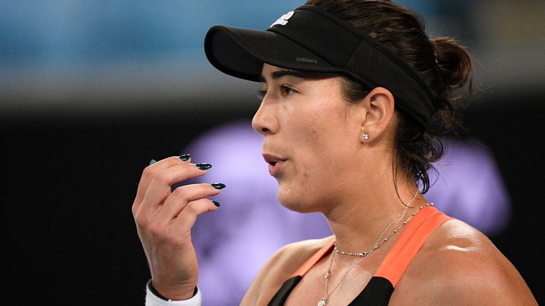 Spain's Garbine Muguruza waits to receive serve from United States' Sofia Kenin during a tuneup event ahead of the Australian Open tennis championships in Melbourne, Australia, Friday, Feb. 5, 2021.(AP Photo/Andy Brownbill)