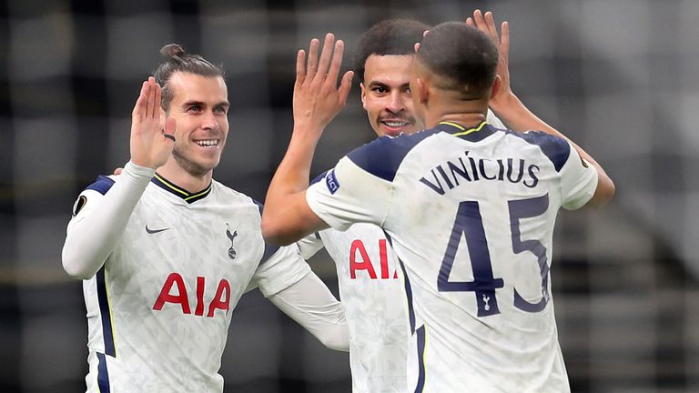 Gareth Bale celebrates with fellow goalscorers Dele Alli and Carlos Vinicius