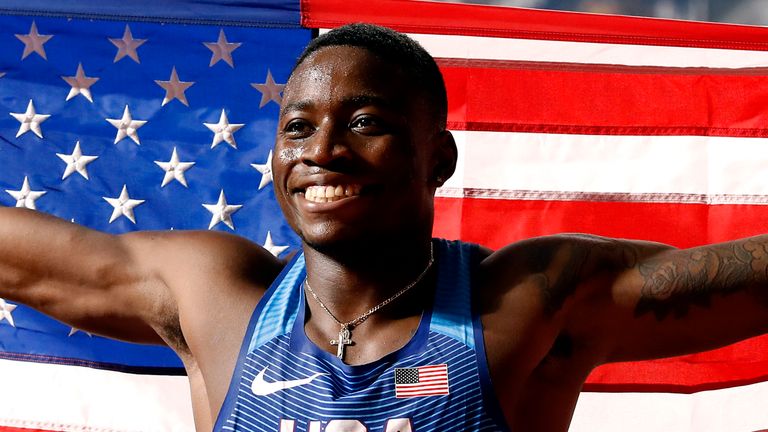 Grant Holloway celebrates after becoming world champion  in 2019