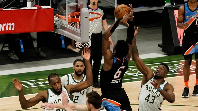 Oklahoma City Thunder&#39;s Hamidou Diallo dunks during the first half of an NBA basketball game against the Milwaukee Bucks