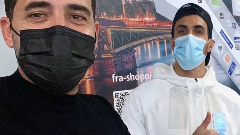 Elhamed (right) flew to Israel with his agent (credit: Dudu Dahan)