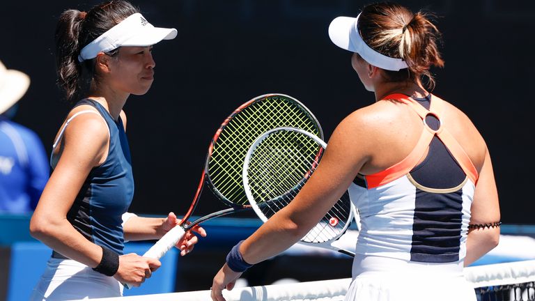 Taiwan's Hsieh Su-Wei, left, is congratulated by Canada's Bianca Andreescu after winning their second round match at the Australian Open tennis championship in Melbourne, Australia, Wednesday, Feb. 10, 2021.(AP Photo/Rick Rycroft)