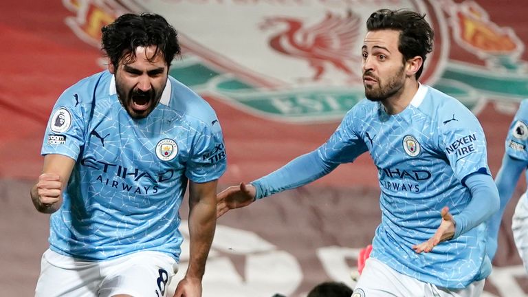 Ilkay Gundogan celebrates scoring for Man City against Liverpool