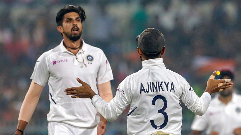 India's Ishant Sharma celebrates a Bangladesh wicket with team-mate Ajinkya Rahane during the second Test in Kolkata