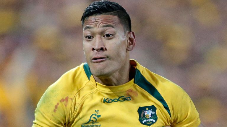 Australia's Wallabies' player Israel Folau  runs with the ball during the first rugby test match against the British and Irish Lions in Brisbane, Australia, Saturday, June 22, 2013. The Lions won the match 23-21.(AP Photo/Rob Griffith)