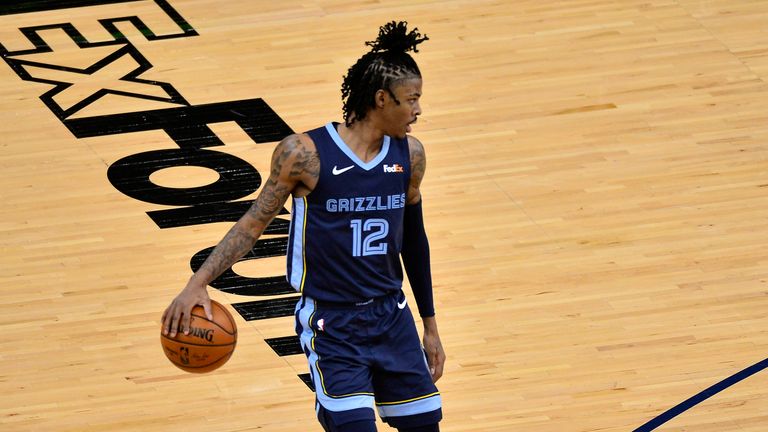 Memphis Grizzlies guard Ja Morant handles the ball against the Charlotte Hornets