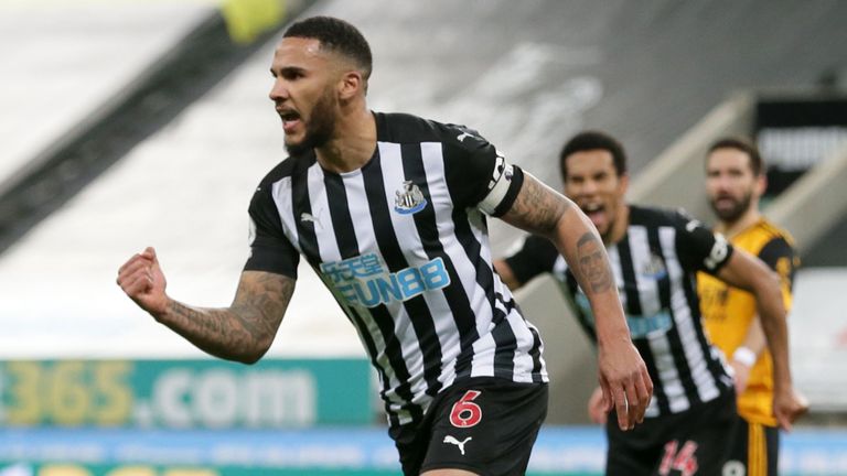 Jamaal Lascelles celebrates after heading Newcastle in front against Wolves