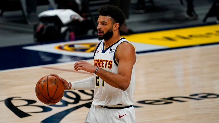AP - Denver Nuggets guard Jamal Murray (27) in the first half 