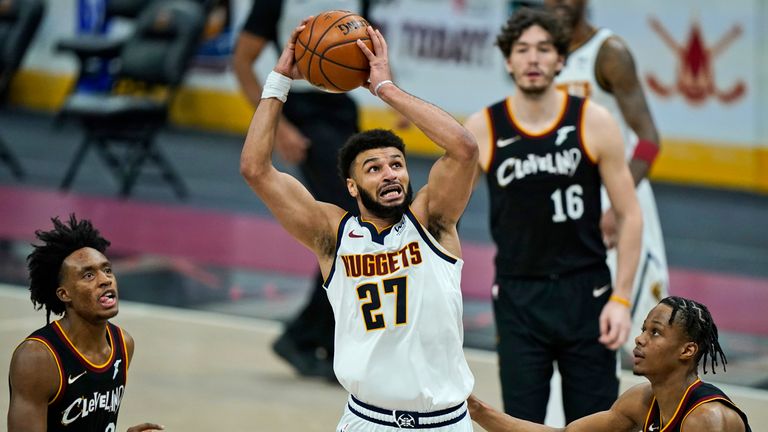Denver Nuggets' Jamal Murray shoots against the Cleveland Cavaliers
