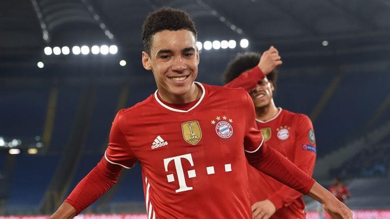 Jamal Musiala of Bayern Munich celebrates after scoring their side&#39;s second goal against Lazio during the UEFA Champions League Round of 16 match at the Olimpico Stadium on February 23, 2021 in Rome, Italy