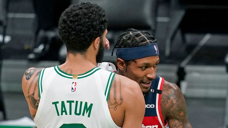 Boston Celtics forward Jayson Tatum chats with Washington Wizards guard Bradley Beal after an NBA basketball game