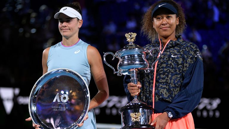 Japan...s Naomi Osaka, right, holds the Daphne Akhurst Memorial Cup defeating United States Jennifer Brady, left, in the women's singles finalat the Australian Open tennis championship in Melbourne, Australia, Saturday, Feb. 20, 2021.(AP Photo/Andy Brownbill)