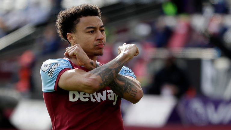 Jesse Lingard celebrates his goal against Spurs (AP)