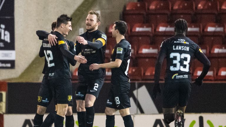 Julien Serrano (left) provided the cross which Lewis dropped for Livingston's opener