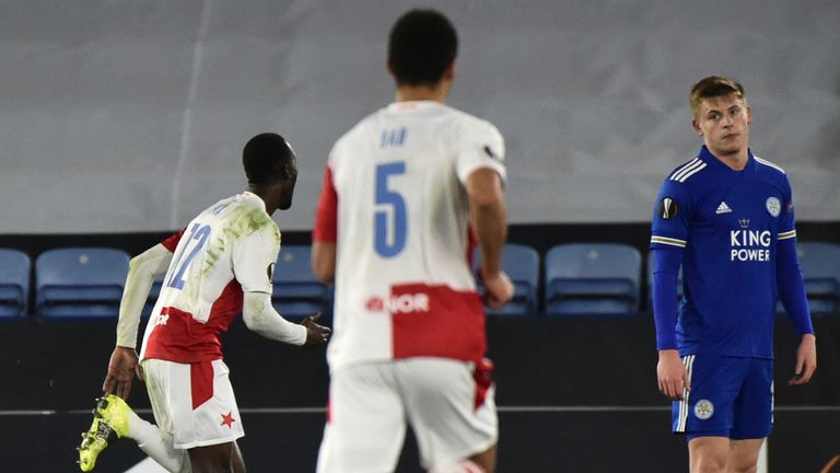 Slavia's Abdallah Sima, second left, celebrates after scoring his side's second goal during the Europa League round of 32 soccer match between Leicester City and Slavia Prague at the King Power Stadium in Leicester, England, Thursday, Feb 25, 2021. (AP Photo/Rui Vieira)