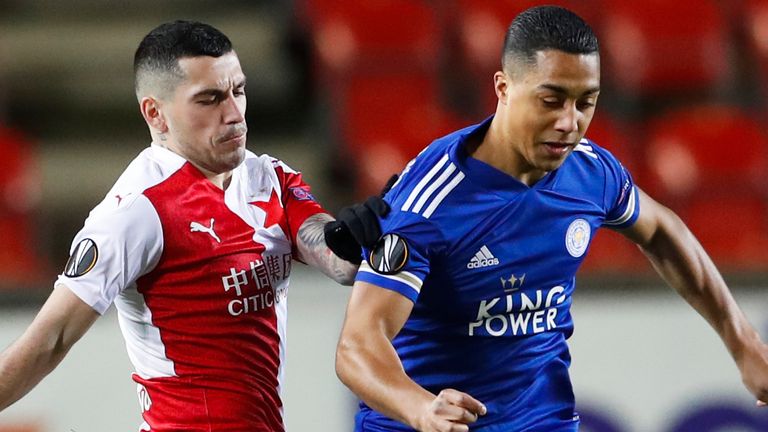 Slavia Prague's Nicolae Stanciu, left, and Leicester's Youri Tielemans challenge for the ball