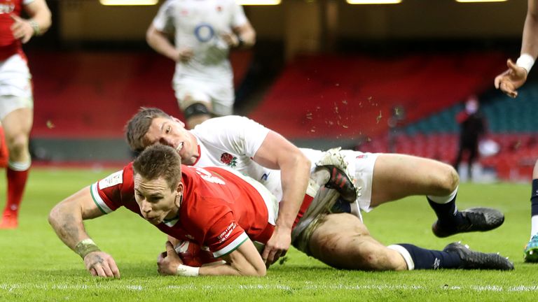 Wales' Liam Williams dives in to score his sides second try during the Guinness Six Nations match at the Principality Stadium, Cardiff. Picture date: Saturday February 27, 2021. See PA story RUGBYU Wales. Photo credit should read: David Davies/PA Wire. RESTRICTIONS: Use subject to restrictions. Editorial use only, no commercial use without prior consent from rights holder.