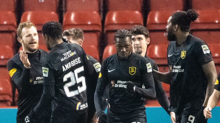 ABERDEEN, SCOTLAND - FEBRUARY 02: Livingston players celebrate Nicky Devlin's goal to make it 2-0 during the Scottish Premiership match between Aberdeen and Livingston at Pittodrie Stadium on February 02, 2021, in Aberdeen, Scotland. (Photo by Craig Foy / SNS Group)