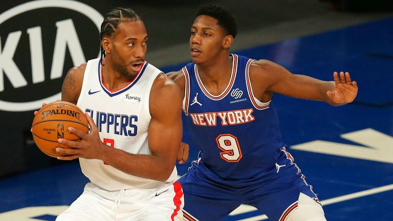 AP - Los Angeles Clippers small forward Kawhi Leonard (2) controls the ball against New York Knicks shooting guard RJ Barrett (9) 