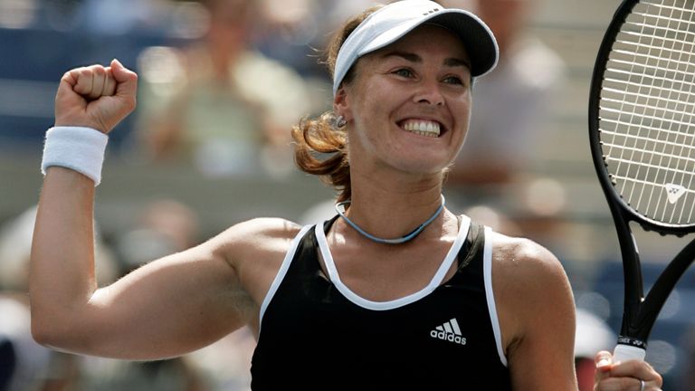 Swiss tennnis player Martina Hingis celebrates after defeating Pauline Parmentier of France at the US Open tennis tournament in New York. Five-time Grand Slam singles champion Hingis heads the 2013 class for the International Tennis Hall of Fame. 