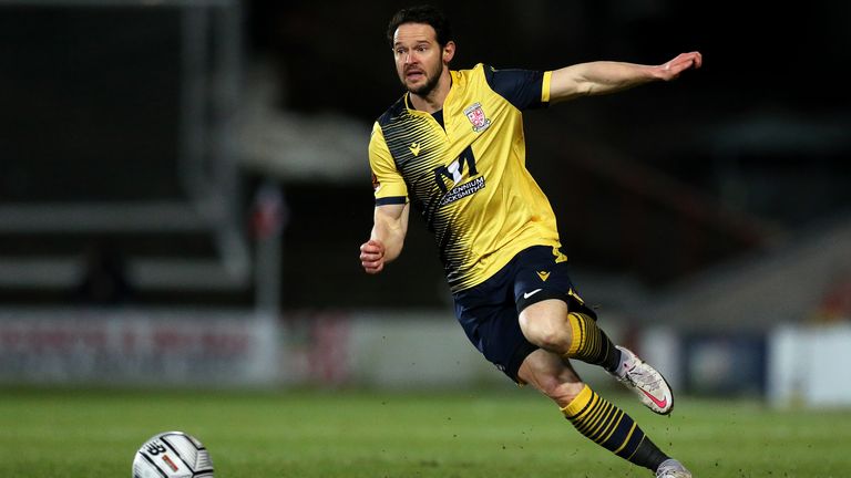 Matt Jarvis of Woking in possession during the Vanarama National League match between between Wrexham and Woking at Racecourse Ground on February 16, 2021 in Wrexham, Wales.