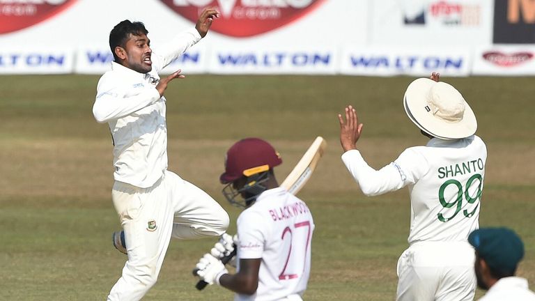 TOPSHOT - Bangladesh's Mehidy Hasan (2L) with his teammates celebrates after the dismissal of West Indies' Jermaine Blackwood(C) during the third day of the first cricket Test match between Bangladesh and West Indies at the Zohur Ahmed Chowdhury Stadium in Chittagong on February 5, 2021. (Photo by Munir Uz zaman / AFP) (Photo by MUNIR UZ ZAMAN/AFP via Getty Image