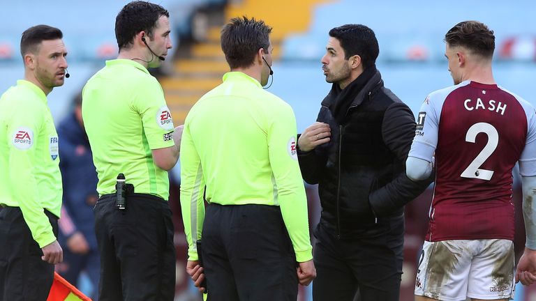 Arsenal's Mikel Arteta speaks with officials after his side's 1-0 defeat at Aston Villa