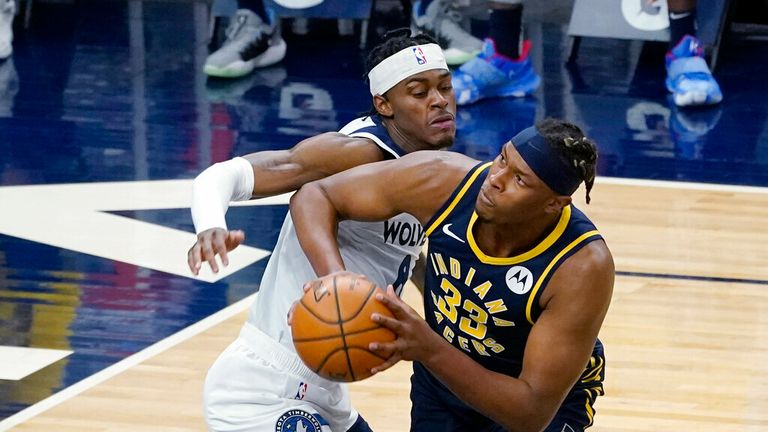 AP - Indiana Pacers&#39; Myles Turner (33) eyes the basket as he works around Minnesota Timberwolves&#39; Jaylen Nowell 