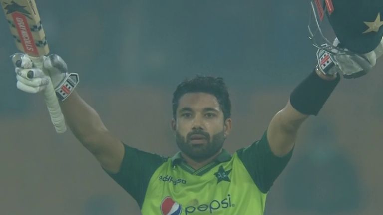 Pakistan&#39;s Mohammad Rizwan celebrates reaching his maiden T20 hundred with a six
