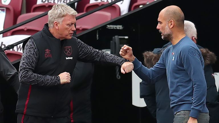 West Ham manager David Moyes (left) with Manchester City manager Pep Guardiola
