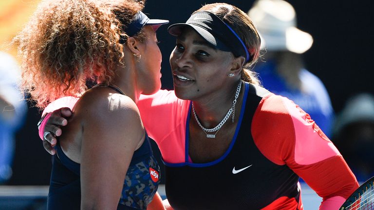 Japan's Naomi Osaka, left, is congratulated by United States' Serena Williams after winning their semifinal match at the Australian Open tennis championship in Melbourne, Australia, Thursday, Feb. 18, 2021.(AP Photo/Andy Brownbill)