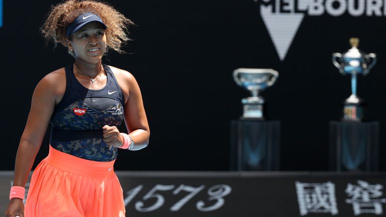Japan's Naomi Osaka reacts after defeating Taiwan's Hsieh Su-wei in their quarterfinal match at the Australian Open tennis championship in Melbourne, Australia, Tuesday, Feb. 16, 2021.(AP Photo/Hamish Blair)