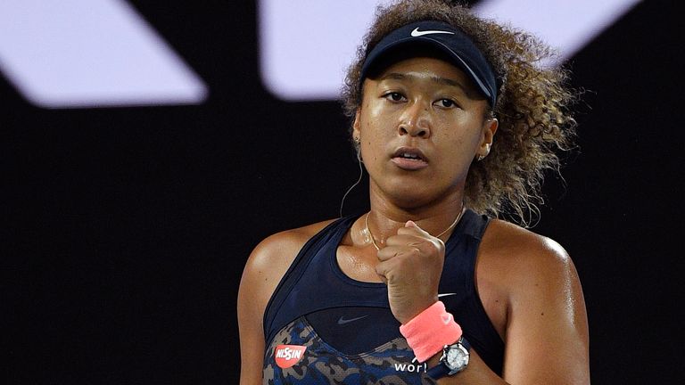 Japan's Naomi Osaka reacts after winning the first set against United States' Jennifer Brady during the women's singles final at the Australian Open tennis championship in Melbourne, Australia, Saturday, Feb. 20, 2021.(AP Photo/Andy Brownbill)
