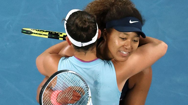 Japan's Naomi Osaka, top, is congratulated by United States' Jennifer Brady during the women's singles final at the Australian Open tennis championship in Melbourne, Australia, Saturday, Feb. 20, 2021.(AP Photo/Hamish Blair)