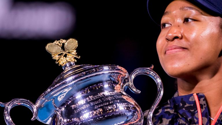 Naomi Osaka of Japan hold her trophy after winning the Women's Singles Final of the 2021 Australian Open on February 20 2021, at Melbourne Park in Melbourne, Australia. (Photo by Jason Heidrich/Icon Sportswire) (Icon Sportswire via AP Images)