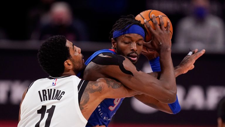 Jerami Grant battles with Kyrie Irving during the Pistons win over the Nets (AP Photo/Carlos Osorio)