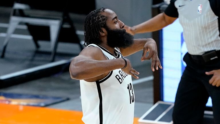 Brooklyn Nets guard James Harden celebrates a 3-pointer against the Phoenix Suns during the second half of an NBA basketball game Tuesday, Feb. 16, 2021, in Phoenix.