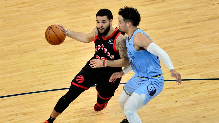 Toronto Raptors guard Fred VanVleet, left, handles the ball against Memphis Grizzlies guard Dillon Brooks, right, in the second half of an NBA basketball game Monday, Feb. 8, 2021, in Memphis, Tenn. (AP Photo/Brandon Dill)


