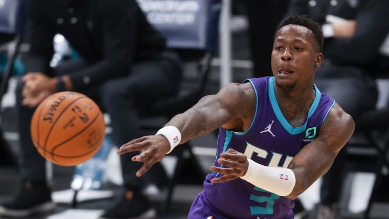 Charlotte Hornets guard Terry Rozier passes against the San Antonio Spurs (AP Photo/Nell Redmond)