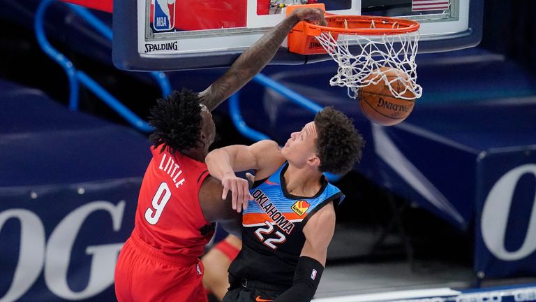 Portland Trail Blazers forward Nassir Little (9) dunks over Oklahoma City Thunder center Isaiah Roby (22) during the first half of an NBA basketball game Tuesday, Feb. 16, 2021, in Oklahoma City.