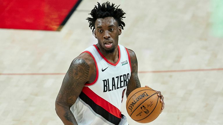 Portland Trail Blazers forward Nassir Little dribbles against the Oklahoma City Thunder during the first half of an NBA basketball game in Portland, Ore., Monday, Jan. 25, 2021.