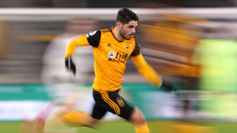 Wolverhampton Wanderers' Pedro Neto in action during the English Premier League soccer match between Wolverhampton Wanderers and Leeds United at the Molineux Stadium in Wolverhampton, England, Friday, Feb. 19, 2021. (Alex Pantling/Pool via AP)