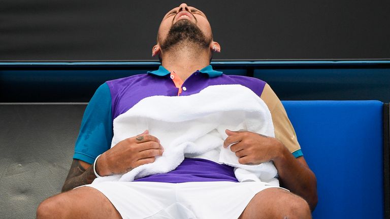 Australia's Nick Kyrgios reacts during a break in his match against France's Alexandre Muller at a tuneup tournament ahead of the Australian Open tennis championships in Melbourne, Australia, Tuesday, Feb. 2, 2021. (AP Photo/Andrew Brownbill)