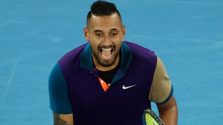 Australia's Nick Kyrgios celebrates after breaking serve in the second set during his third round match against Austria's Dominic Thiem at the Australian Open tennis championship in Melbourne, Australia, Friday, Feb. 12, 2021.(AP Photo/Hamish Blair)